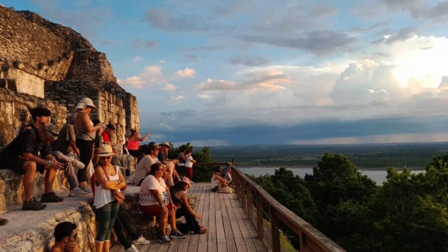 Flores: Yaxha Shared Sunset Tour with Transportation & Guide - Inside Yaxha: Acropolis, Palaces, Temples, and Ball Courts
